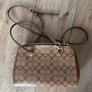 Coach Brown Crossbody Bag with Monogram Pattern
